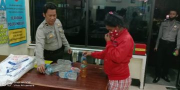 Belasan Botol Sopi Diamankan,  Seorang Wanita Diciduk Polisi